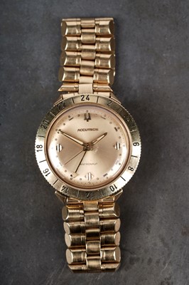 Lot 454 - Accutron Bulova Astronaut GMT: an 18ct yellow gold cased quartz wristwatch