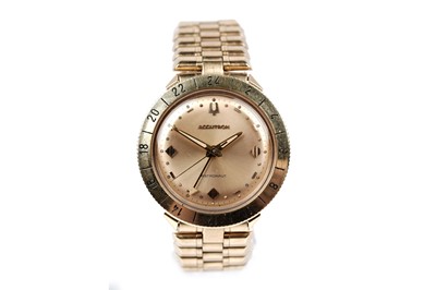 Lot 454 - Accutron Bulova Astronaut GMT: an 18ct yellow gold cased quartz wristwatch