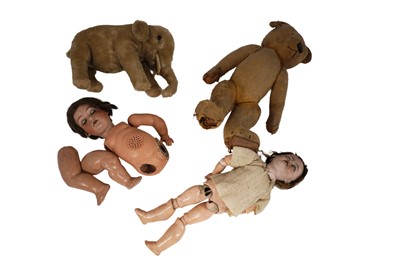 Lot 195 - Two late 19th Century bisque headed dolls; and two plush toys