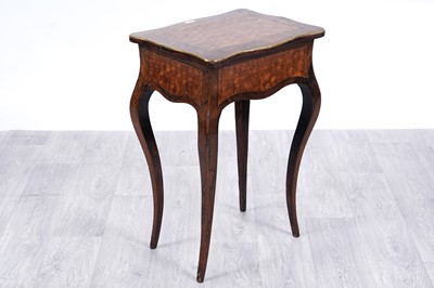 Lot 32 - A Louis XV style parquetry inlaid kingwood and walnut banded worktable