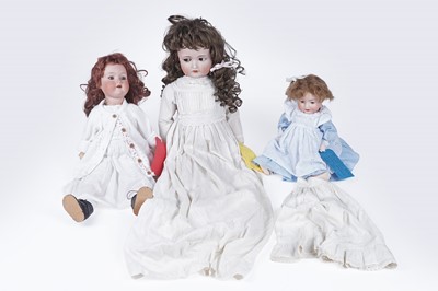 Lot 912 - A collection of three early 20th Century bisque headed dolls