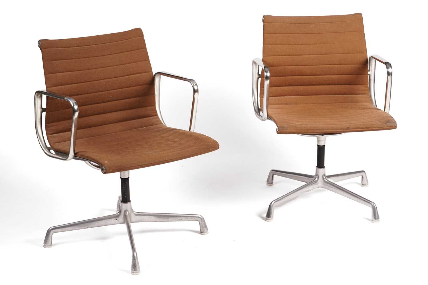 Lot 628 - Charles and Ray Eames for Herman Miller: a pair of mid-20th Century EA108 revolving office chairs