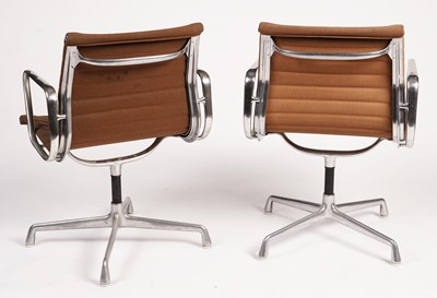 Lot 628 - Charles and Ray Eames for Herman Miller: a pair of mid-20th Century EA108 revolving office chairs