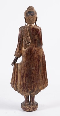 Lot 851 - A Burmese carved and giltwood 'jewelled' figure of Buddha