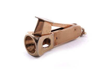 Lot 375 - An Elizabeth II 9ct gold mounted cigar cutter