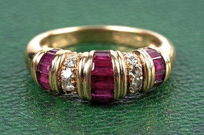 Lot 524 - A ruby and diamond dress ring