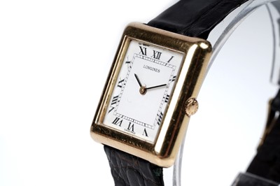 Lot 447 - Longines: an 18ct yellow gold cased manual wind wristwatch
