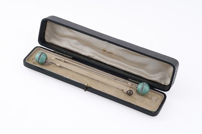 Lot 244 - A cased pair of late 19th Century Austro-Hungarian silver mounted steel hatpins