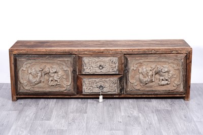 Lot 35 - A 20th Century Chinese carved hardwood sideboard