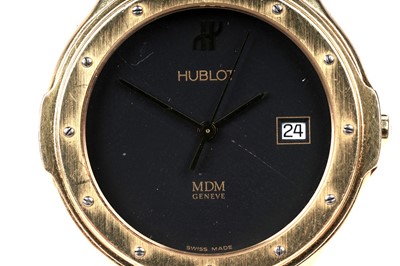 Lot 455 - Hublot MDM: an 18ct yellow gold cased quartz wristwatch