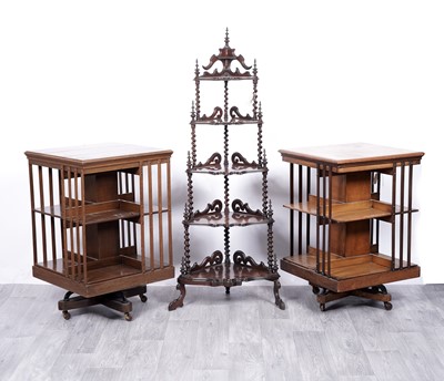 Lot 29 - A Victorian rosewood corner whatnot; and two revolving bookcases