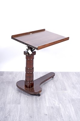Lot 113 - A Victorian style mahogany cantilever bed table