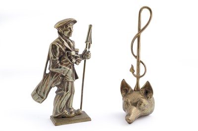 Lot 310 - Two 20th Century cast brass door stops