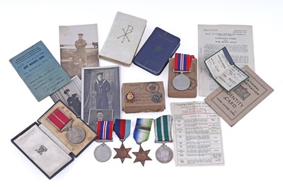 Lot 12 - A WWII BEM medal RN group