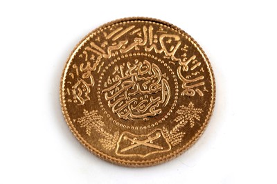 Lot 44 - A Saudi Arabia One Guinea gold coin