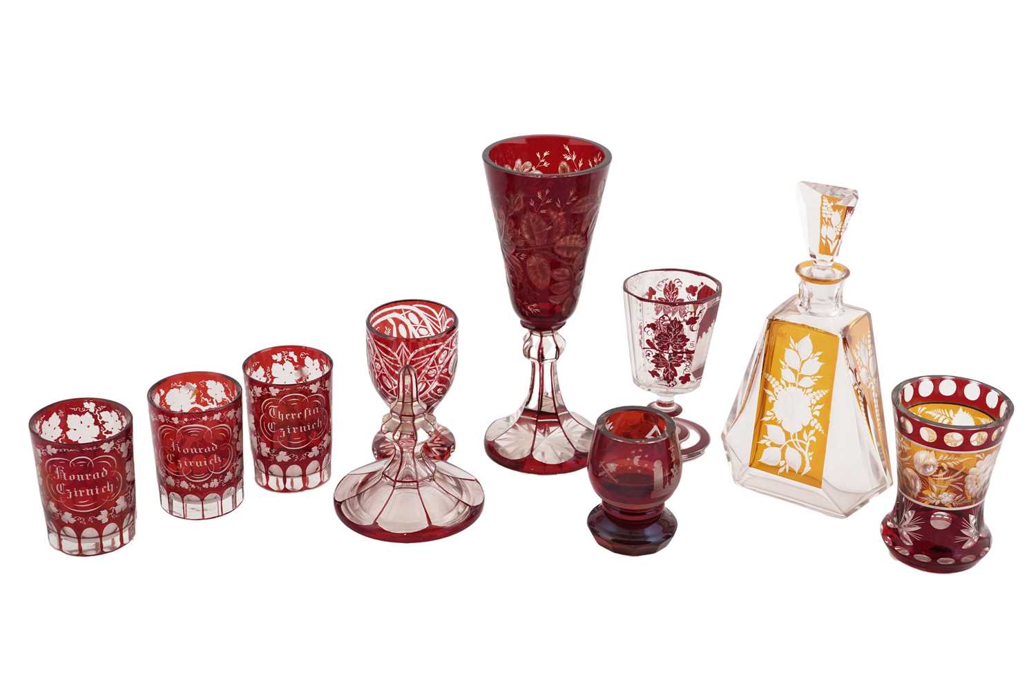 Lot 404 - A collection of Victorian and later ruby and amber bohemian flash cut glass