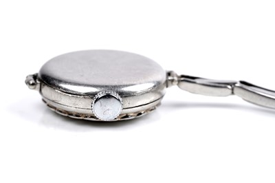 Lot 453 - A diamond set platinum cased cocktail watch