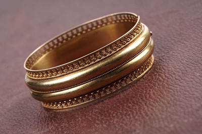 Lot 511 - A fine Victorian yellow gold bangle