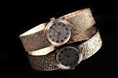 Lot 426 - Omega: a 9ct yellow gold cocktail watch
