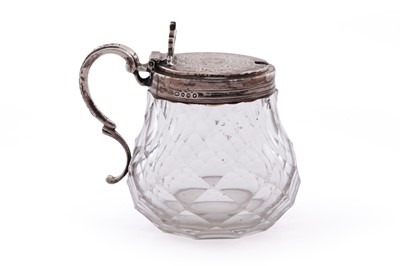 Lot 103 - A Victorian silver mounted clear glass mustard pot