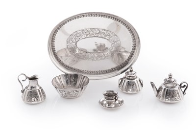 Lot 257 - A late 19th/early 20th Century Dutch silver miniature toy tea set