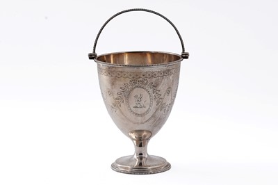 Lot 38 - A George III Silver swing handled sugar antique vase
