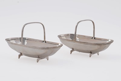 Lot 107 - A pair of George V silver novelty bonbon dishes