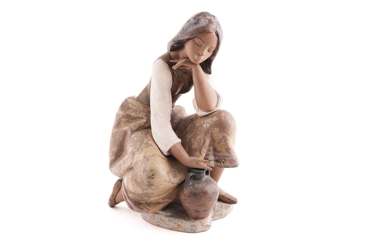 Lot 384 - Lladro: a figure of a water carrier