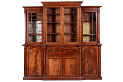 Lot 1048 - A George IV mahogany breakfront secretaire bookcase