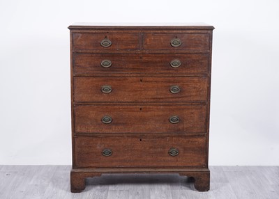 Lot 62 - A George III oak chest of drawers