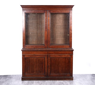 Lot 60 - An early 20th Century oak glazed bookcase