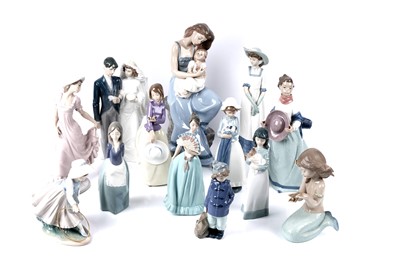 Lot 241 - A collection of thirteen Nao ceramic figures and figure groups