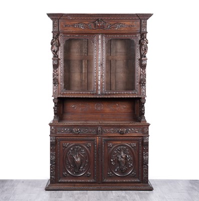 Lot 36 - A Victorian richly carved oak bookcase