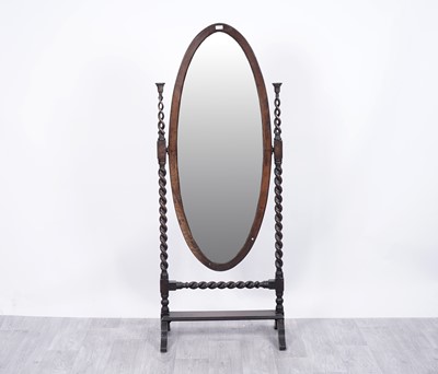 Lot 42 - An early 20th Century oak cheval mirror
