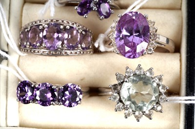 Lot 158 - A collection of amethyst and purple jade rings