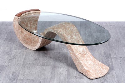 Lot 140 - A contemporary pink marble and glass coffee table