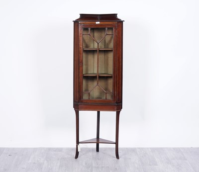 Lot 69 - An Edwardian inlaid mahogany corner display cabinet