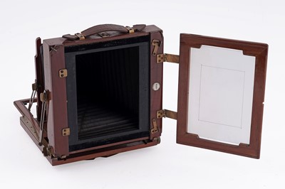 Lot 129 - A Thornton Pickard ‘Ruby’ mahogany and brass plate camera