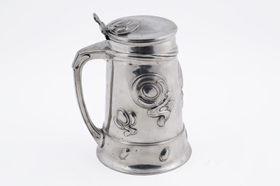 Lot 305 - Oliver Baker for Liberty & Co: an arts and crafts pewter tankard
