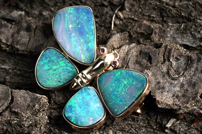 Lot 7 - A black opal doublet and ruby butterfly brooch