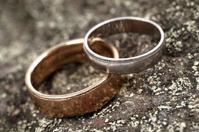Lot 52 - A 9ct gold wedding band; and a platinum wedding band