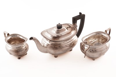 Lot 350 - A George V silver three-piece tea service