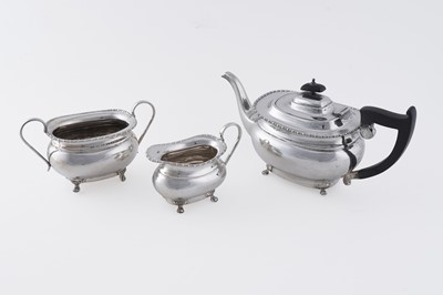 Lot 13 - A George V silver three-piece tea set