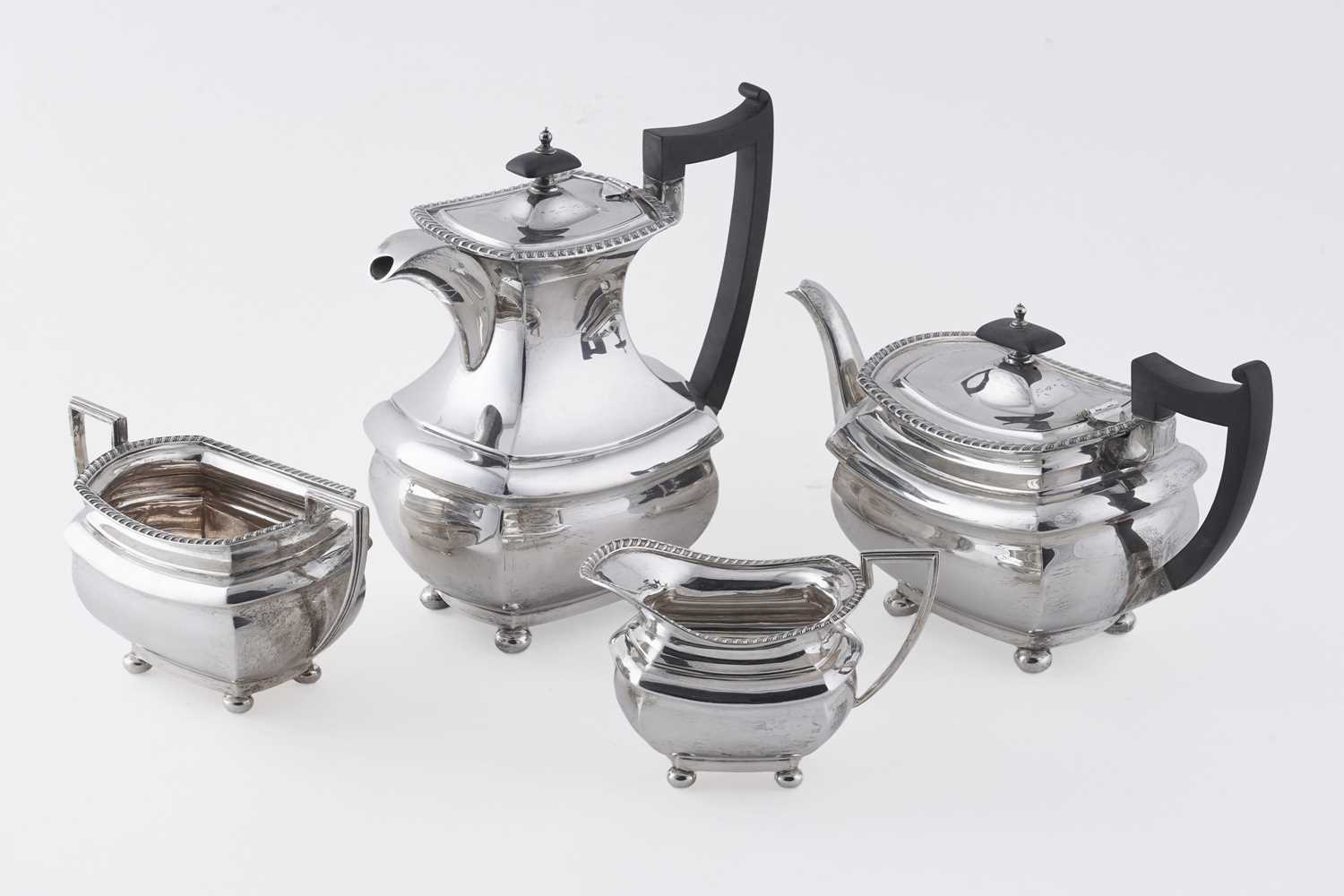 Lot 14 - A George V/Edward VIII silver four-piece tea service