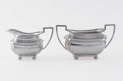Lot 14 - A George V/Edward VIII silver four-piece tea service