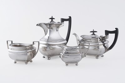 Lot 14 - A George V/Edward VIII silver four-piece tea service