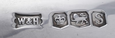 Lot 14 - A George V/Edward VIII silver four-piece tea service