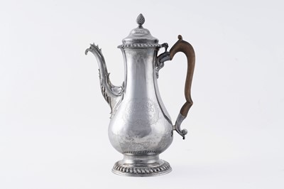 Lot 84 - An early George III silver coffee pot of baluster form