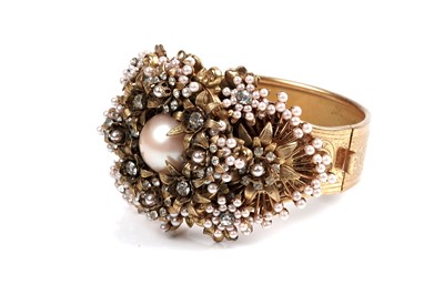 Lot 609 - A Stanley Hagler faux-pearl and paste cuff bracelet