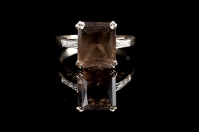 Lot 35 - A smoky quartz and diamond ring
